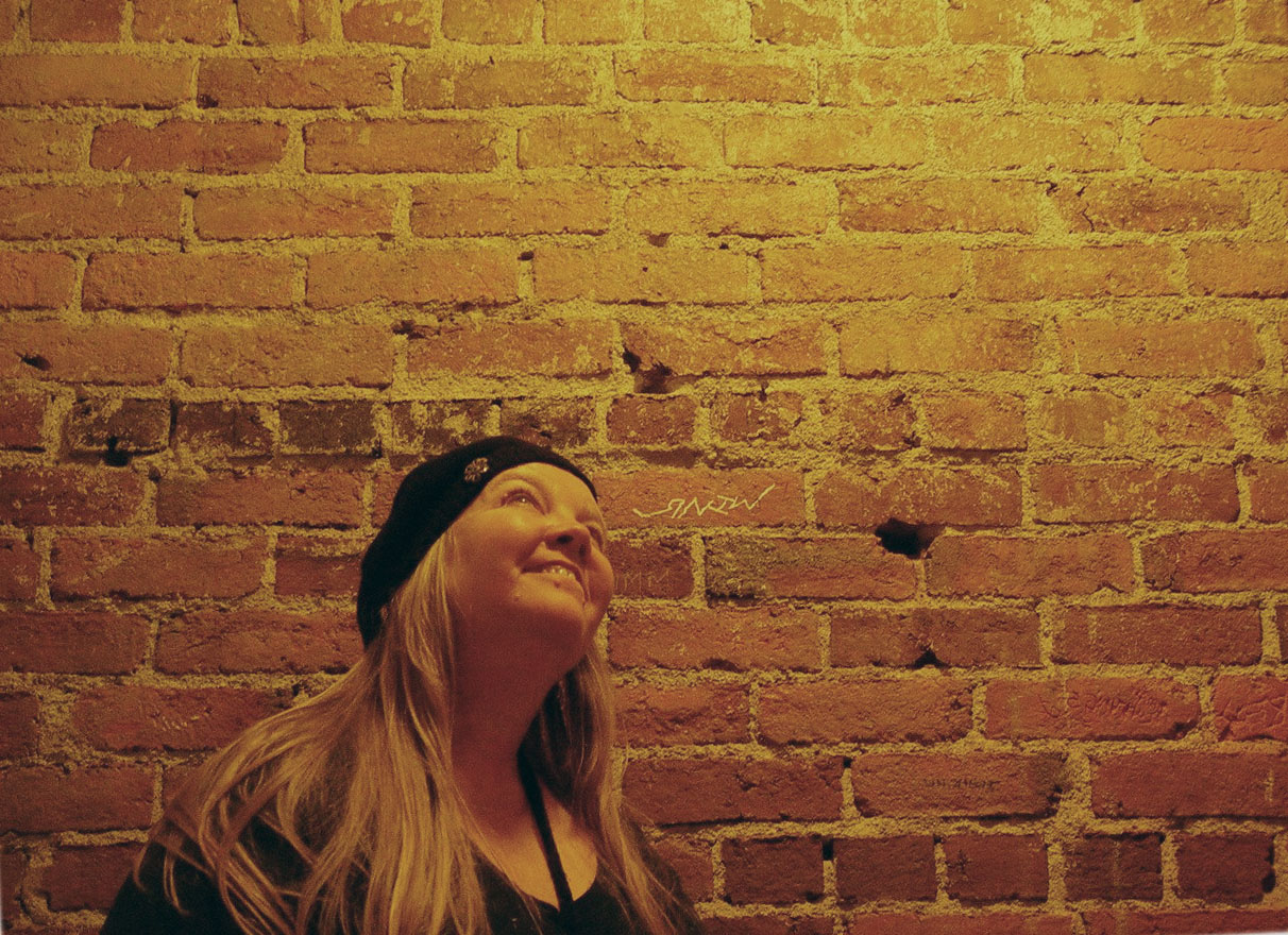Tj Lev in front of brick wall